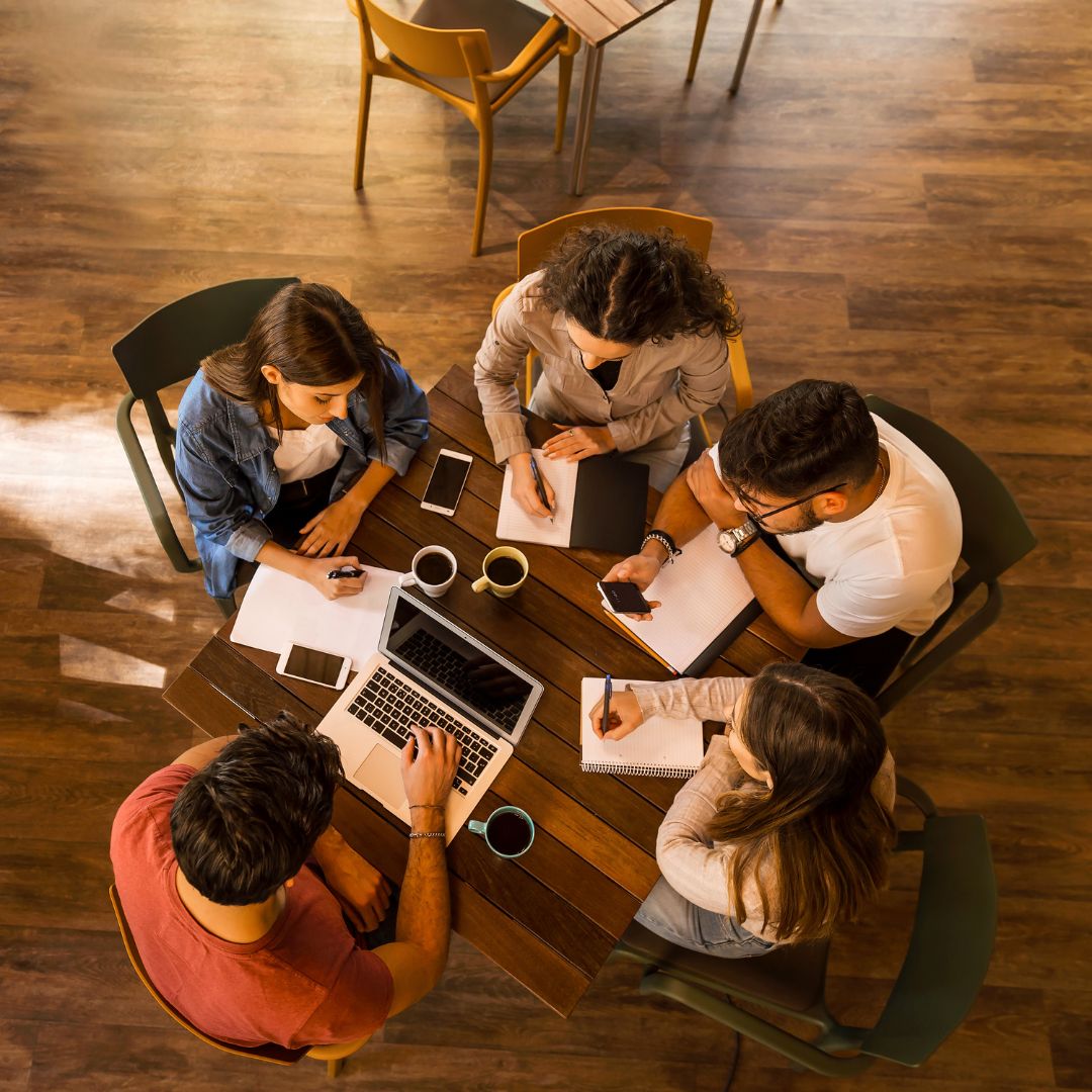 group of writers at table